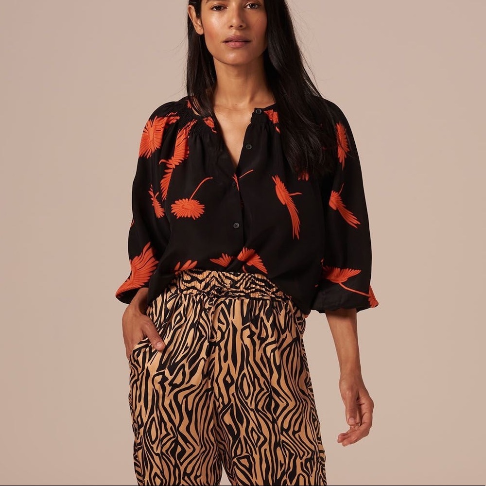 Tucker Black Blouse with Bold Orange Floral and Bird Motifs